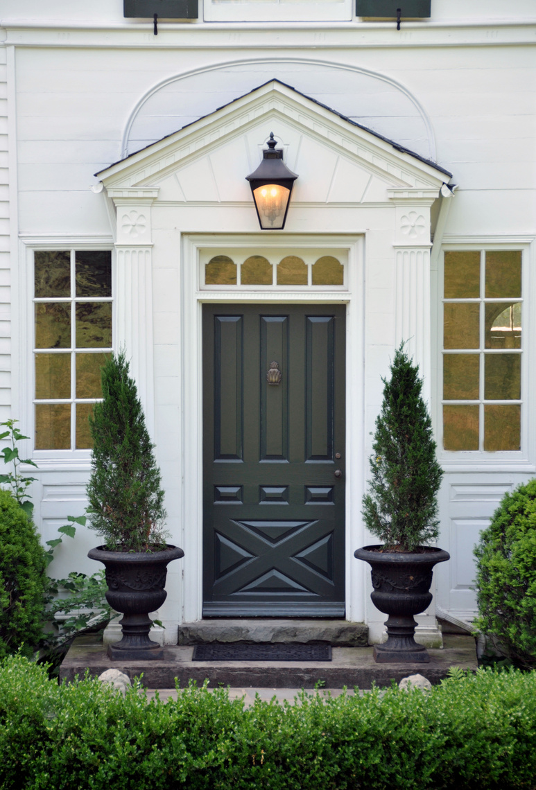 Front door to luxury home With garden landscape
